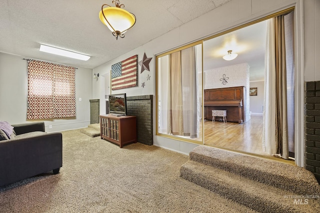827 Alturas Dr N, Twin Falls, ID 83301 - carpeted living area featuring baseboards and a textured ceiling
