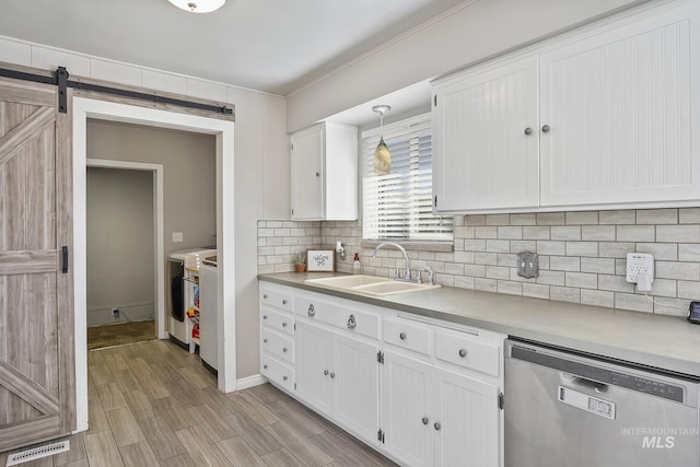 827 Alturas Dr N, Twin Falls, ID 83301 - kitchen with tasteful backsplash, a sink, dishwasher, white cabinets, and visible vents