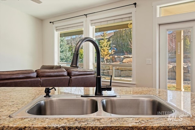 room details featuring light stone counters