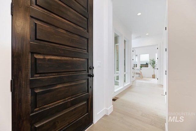 foyer featuring light wood-type flooring