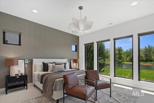 bedroom featuring light colored carpet, recessed lighting, baseboards, and ceiling fan