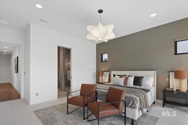 bedroom with recessed lighting