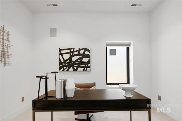 home office featuring baseboards