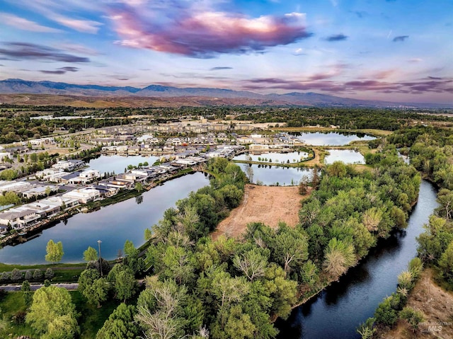 bird's eye view of a water and mountain view
