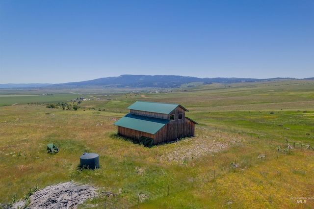 mountain view featuring a rural view