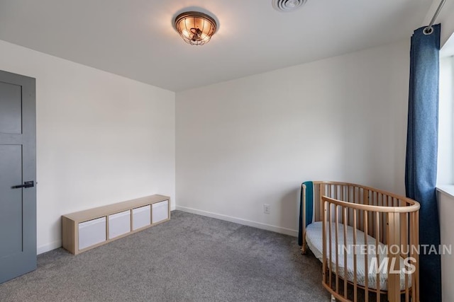 sitting room with carpet flooring and baseboards