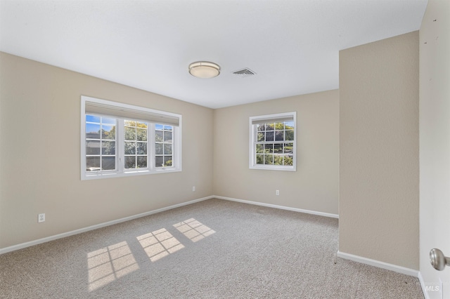 2220 14th St, Lewiston, ID 83501 - empty room with carpet flooring and baseboards