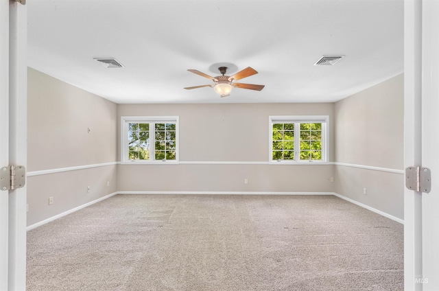 2220 14th St, Lewiston, ID 83501 - carpeted spare room with a ceiling fan, healthy amount of natural light, and baseboards