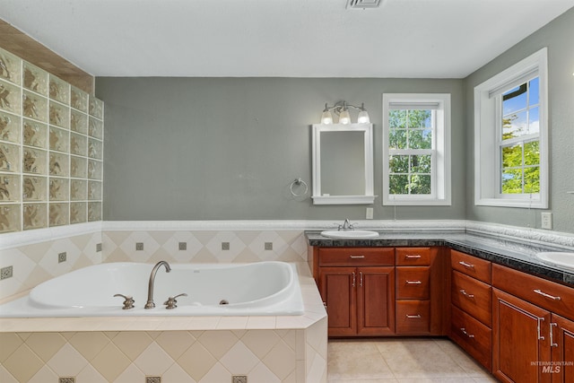 2220 14th St, Lewiston, ID 83501 - full bath with double vanity, a jetted tub, and tile patterned flooring