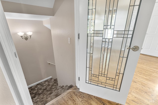 2220 14th St, Lewiston, ID 83501 - bathroom featuring wood finished floors and a chandelier