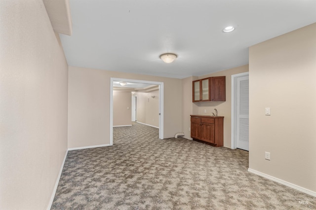 2220 14th St, Lewiston, ID 83501 - empty room featuring light carpet, baseboards, wet bar, and recessed lighting
