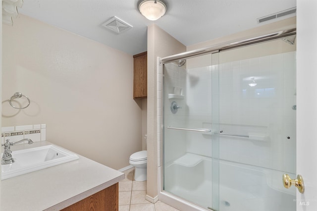 2220 14th St, Lewiston, ID 83501 - full bath featuring a shower stall, toilet, tile patterned flooring, and vanity