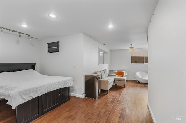 2220 14th St, Lewiston, ID 83501 - bedroom with hardwood / wood-style flooring, baseboards, recessed lighting, and track lighting