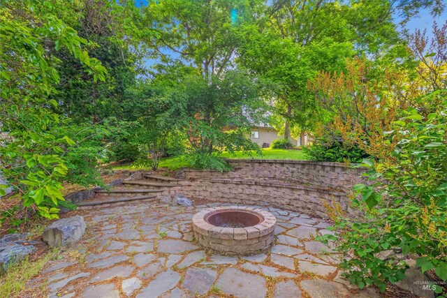 2220 14th St, Lewiston, ID 83501 - view of patio featuring a fire pit