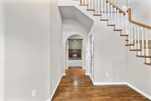 2220 14th St, Lewiston, ID 83501 - hallway with wood finished floors, baseboards, and arched walkways