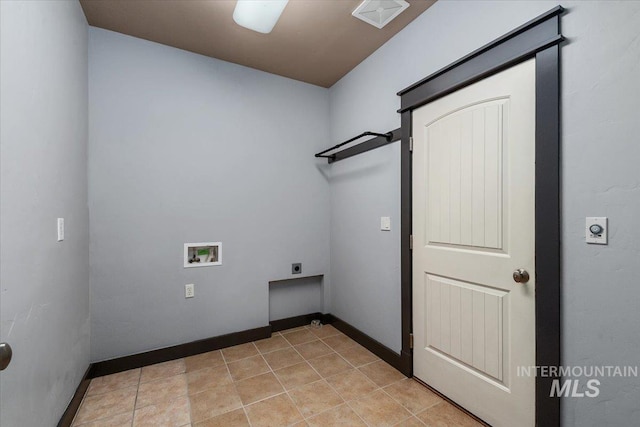 washroom with light tile patterned floors, hookup for a washing machine, and hookup for an electric dryer