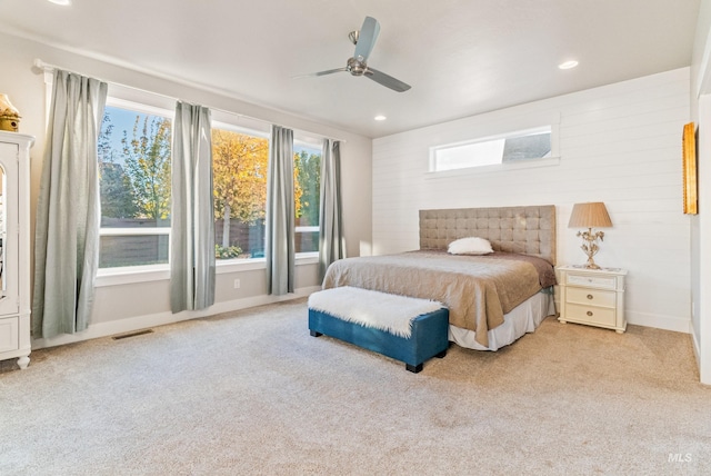 carpeted bedroom featuring ceiling fan