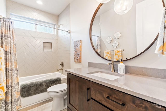 full bathroom featuring vanity, shower / bath combo, wood-type flooring, and toilet