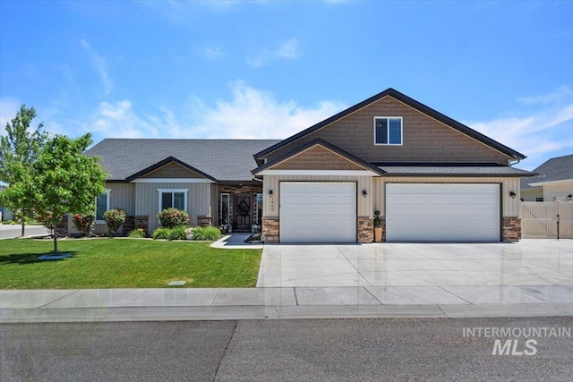 craftsman-style house with a front lawn and a garage