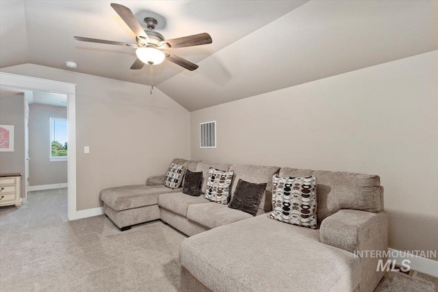 carpeted living room with lofted ceiling and ceiling fan