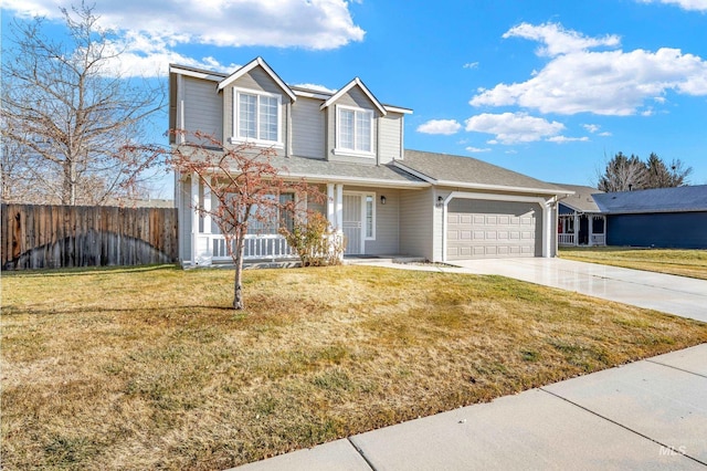 view of front of home with a front lawn and a garage