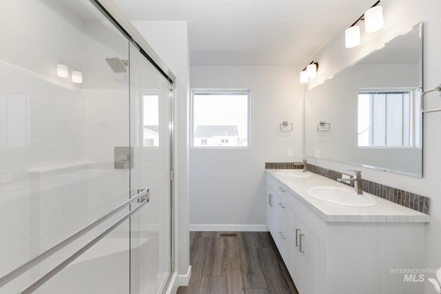 4352 N Glassford Ave, Meridian, ID 83646 - full bath featuring a shower stall, plenty of natural light, baseboards, and a sink