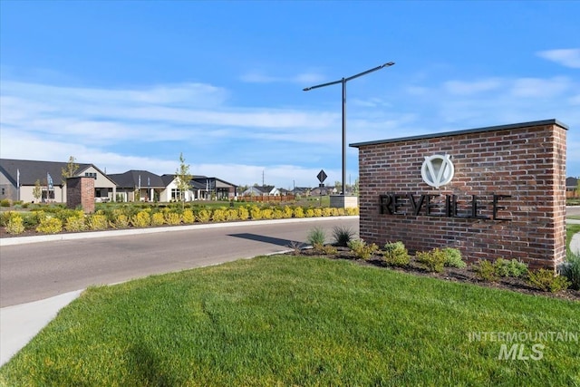 view of community sign