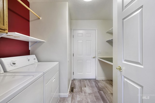 2563 Paintbrush Dr, Twin Falls, ID 83301 - laundry area featuring light wood-style flooring and washer and dryer