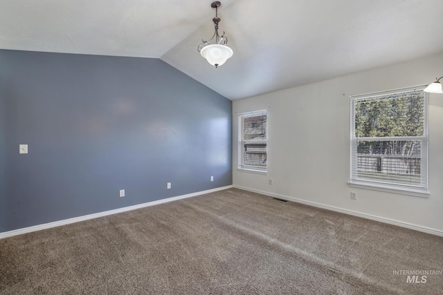 2563 Paintbrush Dr, Twin Falls, ID 83301 - carpeted spare room featuring vaulted ceiling and baseboards