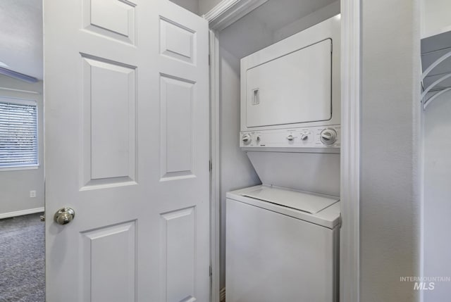 2563 Paintbrush Dr, Twin Falls, ID 83301 - laundry room featuring stacked washer / drying machine and carpet