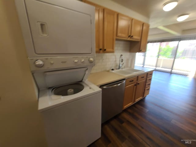 200 N 3rd Unit 401, Boise, ID 83702 - washroom with stacked washer and clothes dryer and dark wood finished floors