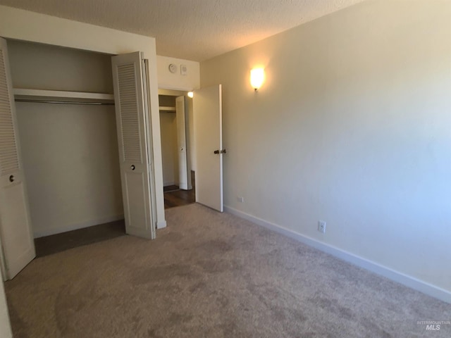 200 N 3rd Unit 401, Boise, ID 83702 - unfurnished bedroom featuring carpet floors, a closet, and baseboards