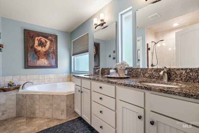 998 E Shadow Creek Ln, Eagle, ID 83616 - bathroom with a garden tub, a shower, and double vanity