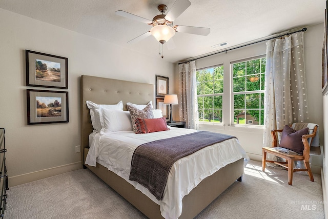 998 E Shadow Creek Ln, Eagle, ID 83616 - bedroom featuring light carpet, baseboards, and a ceiling fan