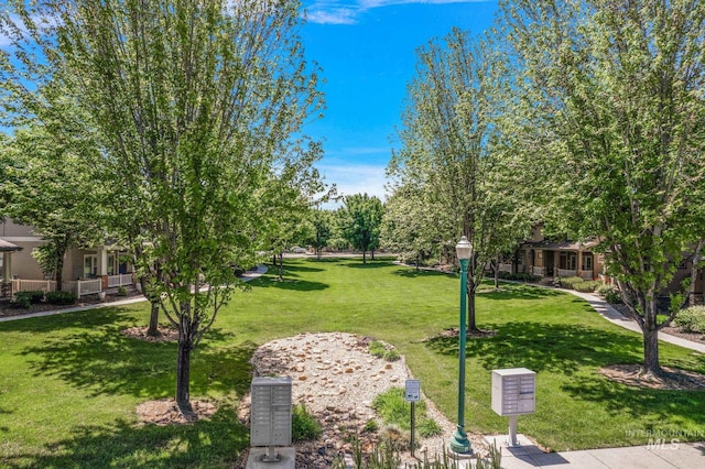 998 E Shadow Creek Ln, Eagle, ID 83616 - view of home's community with mail area and a lawn