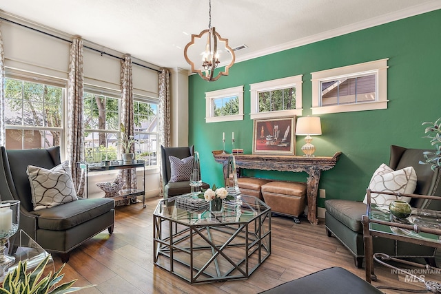 998 E Shadow Creek Ln, Eagle, ID 83616 - sitting room featuring a chandelier, wood finished floors, and crown molding