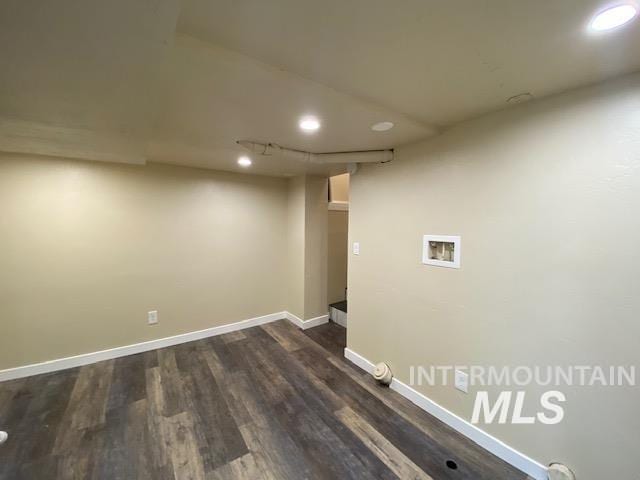 finished basement featuring baseboards, dark wood-type flooring, and recessed lighting
