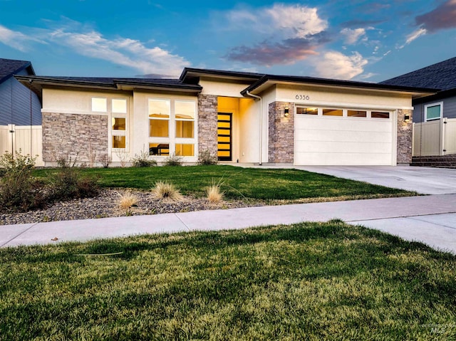 6356 S Cubola Way, Meridian, ID 83642 - prairie-style house with stone siding, stucco siding, concrete driveway, and an attached garage