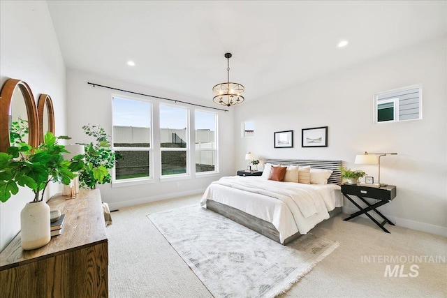 6356 S Cubola Way, Meridian, ID 83642 - bedroom featuring light carpet, baseboards, a chandelier, and recessed lighting