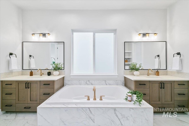 6356 S Cubola Way, Meridian, ID 83642 - full bathroom with marble finish floors, two vanities, and a bath