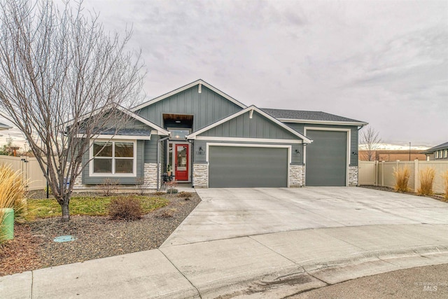 craftsman-style home with a garage