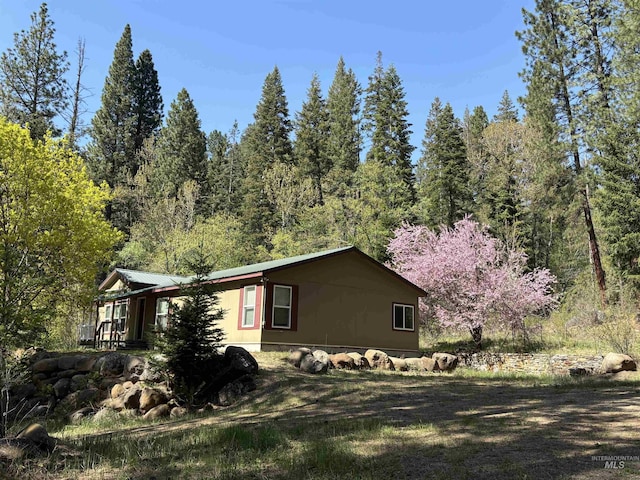 278 Elk Lake Rd, New Meadows, ID 83654 - view of property exterior featuring a forest view
