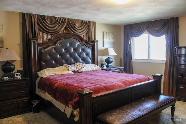 bedroom featuring carpet