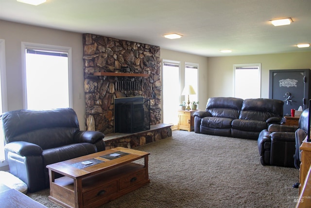 carpeted living room featuring a fireplace