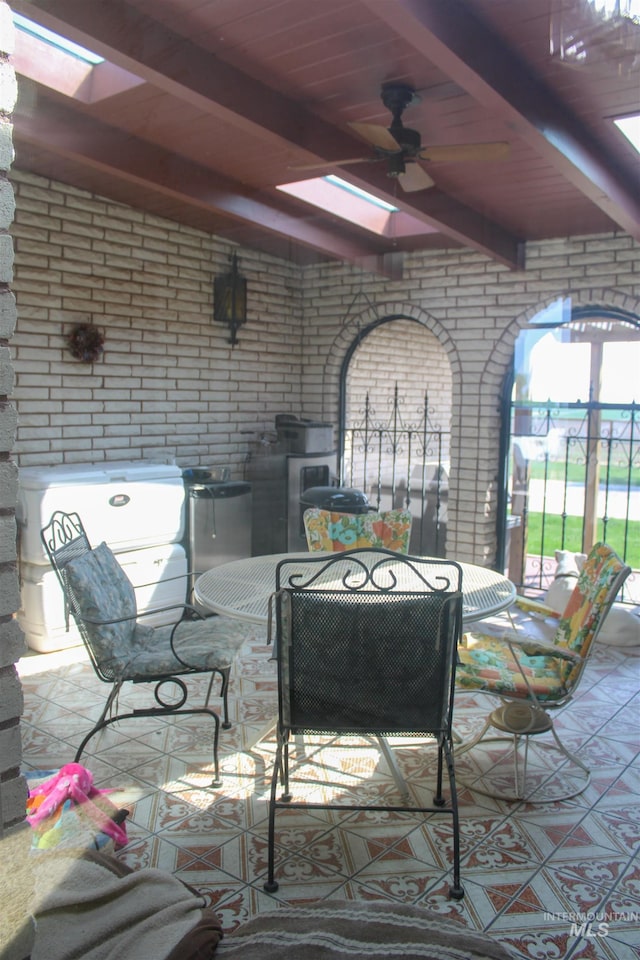 view of patio featuring ceiling fan