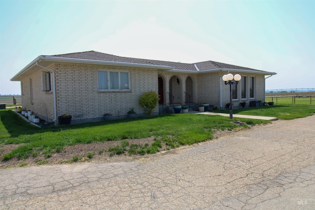 view of front of house with a front yard