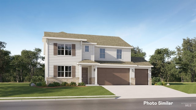 view of front of house featuring a front yard and a garage