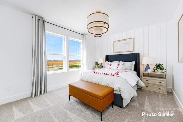 bedroom with light carpet