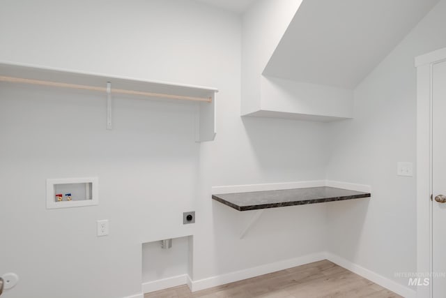 15383 Ivybridge Way, Nampa, ID 83651 - laundry room with light wood-style flooring, baseboards, washer hookup, hookup for an electric dryer, and laundry area