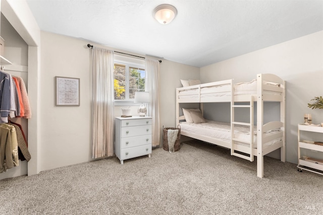 bedroom featuring carpet
